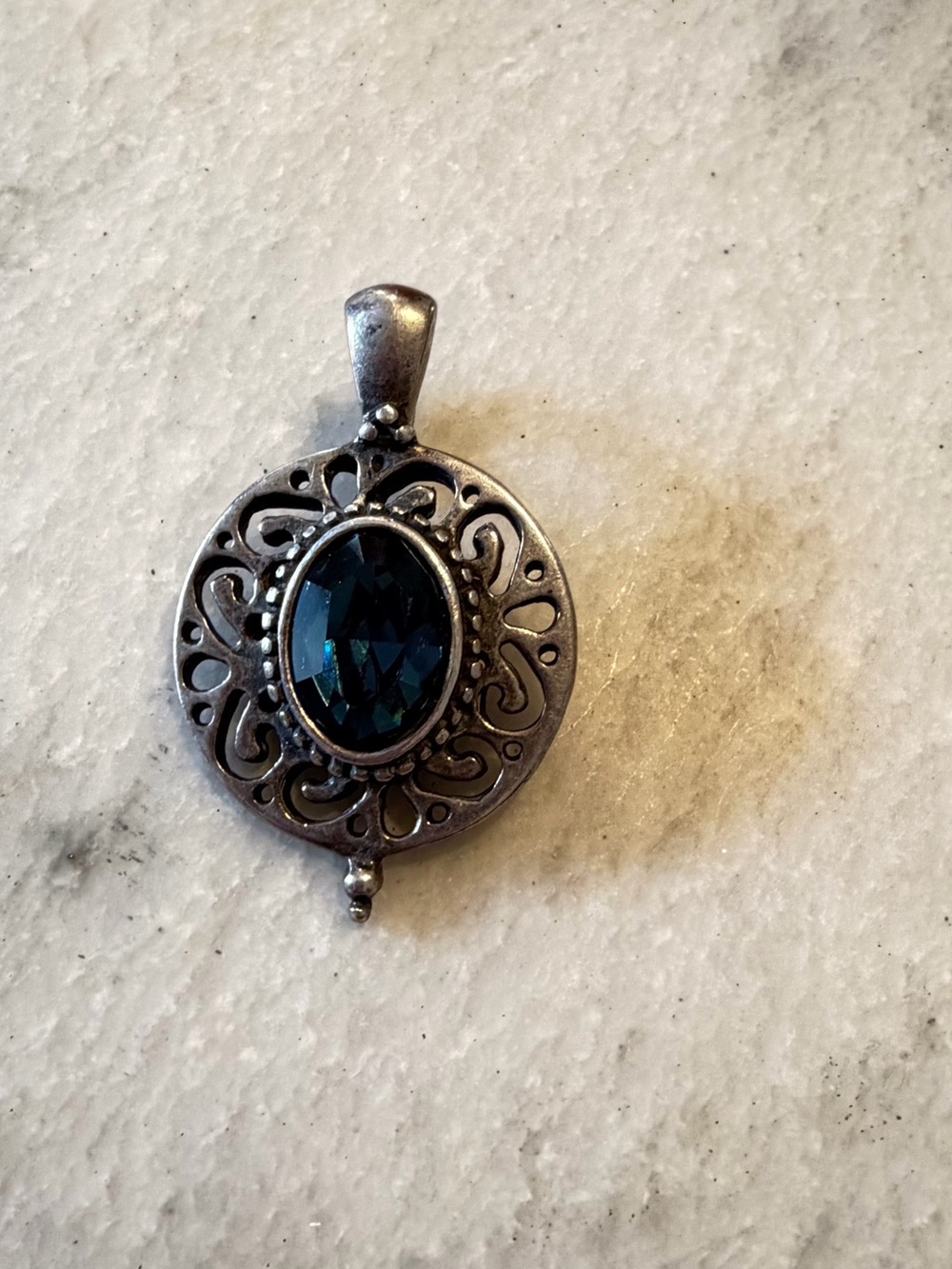 Ornate Silver-Tone Necklace Pendant with Deep Teal Blue Stone